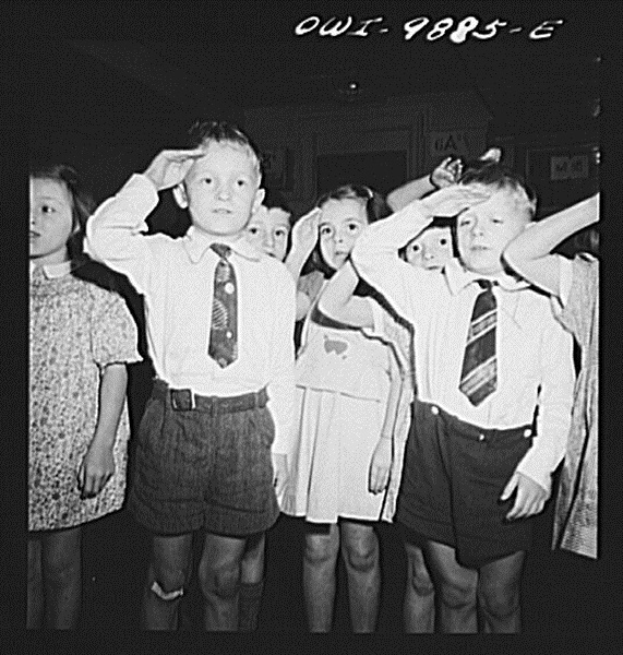 First_graders_in_public_school_saluting_the_flag.8d23028v
