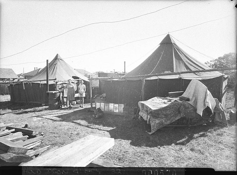 SLNSW_13800_Poor_families_living_under_canvas_at_Lidcombe_Auburn_or_Bankstown_taken_for_Charles_A_Morgan_MHR